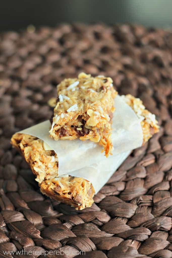 peanut butter granola bars wrapped in parchment stack of three