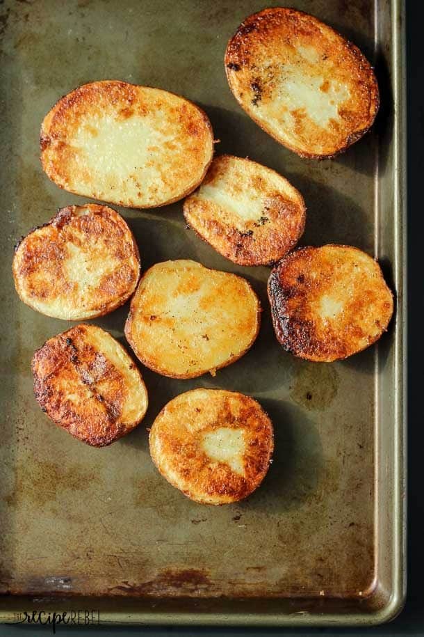 overhead image of crispy roasted potatoes on sheet pan