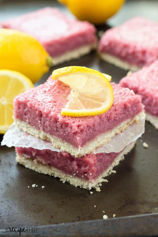 strawberry pineapple lemonade bars stack of two with lemon slice on top