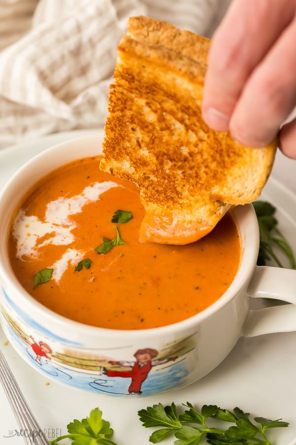 grilled cheese and creamy tomato soup dunking