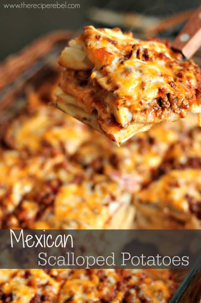 scoop of mexican scalloped potatoes being lifted out of pan with recipe title on bottom