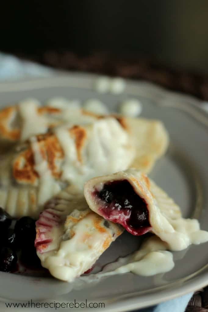 close up image of saskatoon perogies cut in half to reveal filling