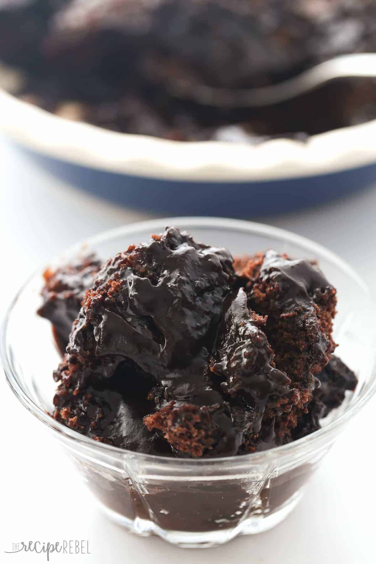 close up image of hot fudge sundae cake with pie plate in the background