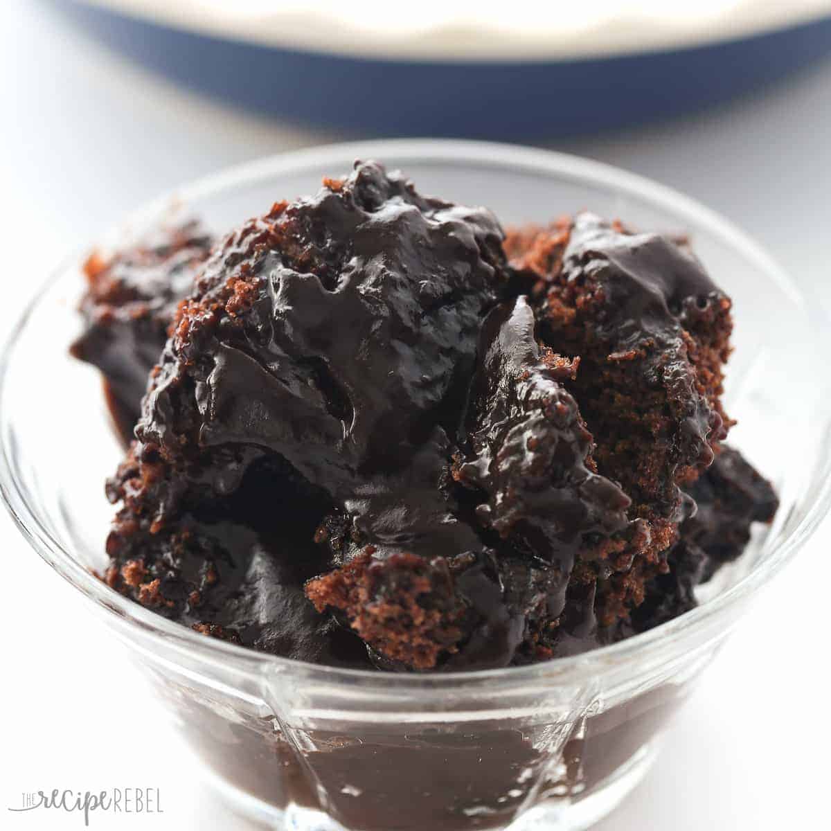 bowl of hot fudge sundae cake with pie plate in the background