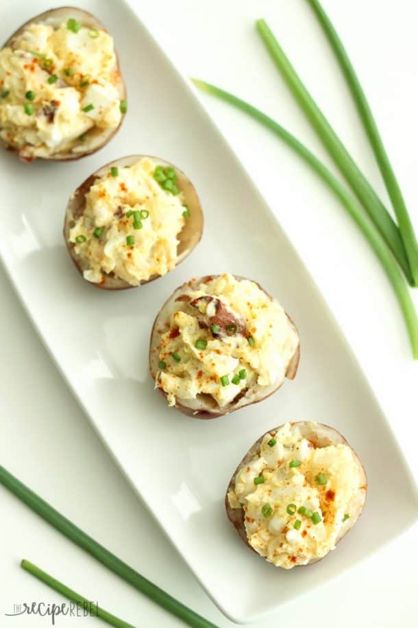 overhead image of potato salad bites with green onions on the side