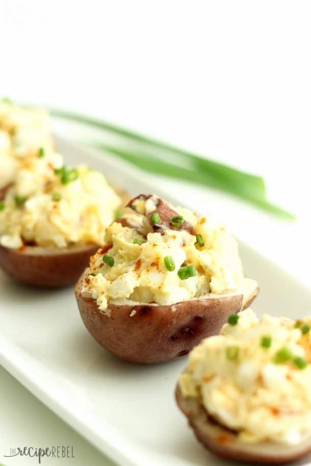 red potatoes cooked and hollowed out and filled with potato salad