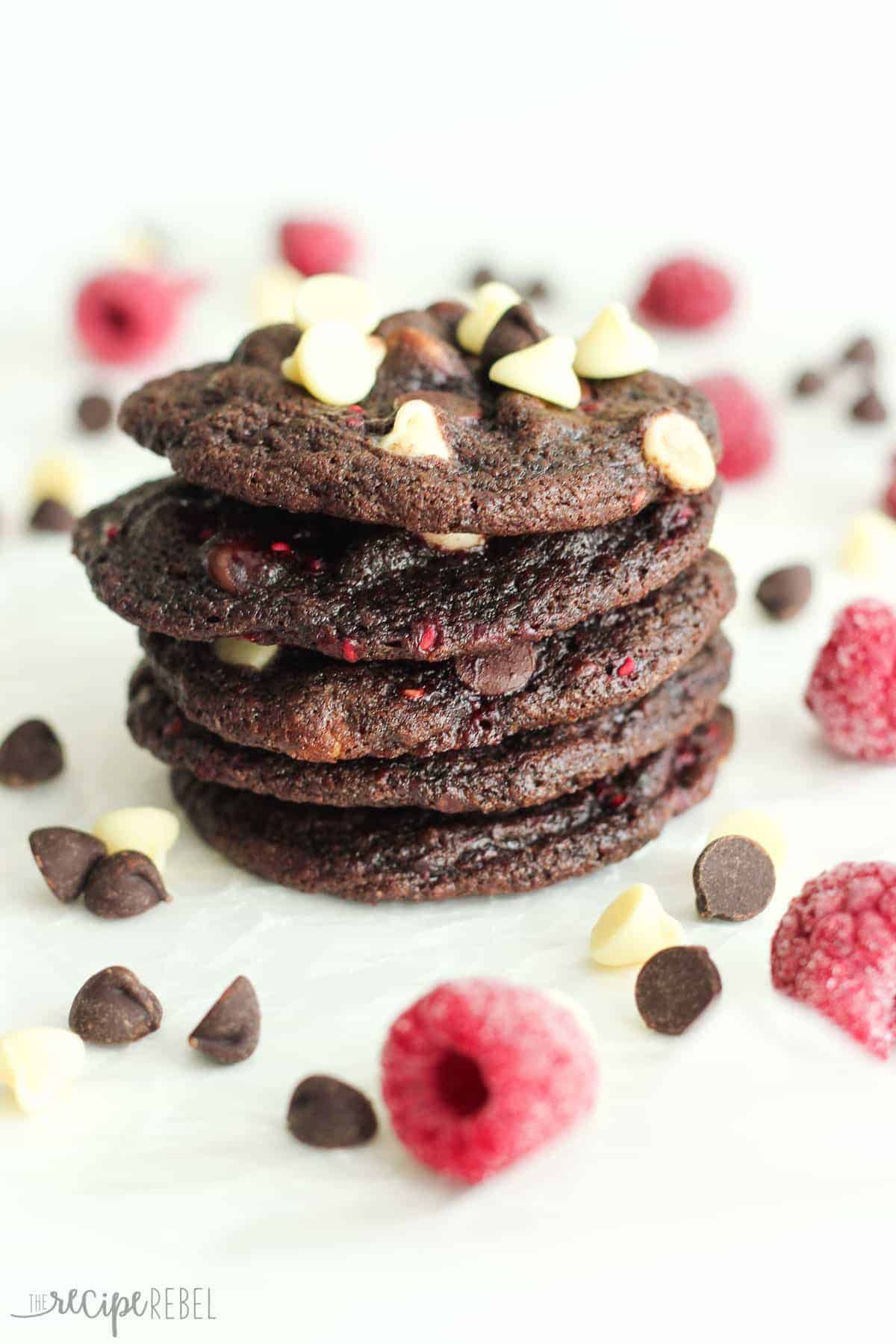 Triple Chocolate Raspberry Cookies are the BEST cookies I've ever eaten! The perfect combination of fruit and chocolate. stack of five triple chocolate raspberry cookies with white chocolate and dark chocolate chips