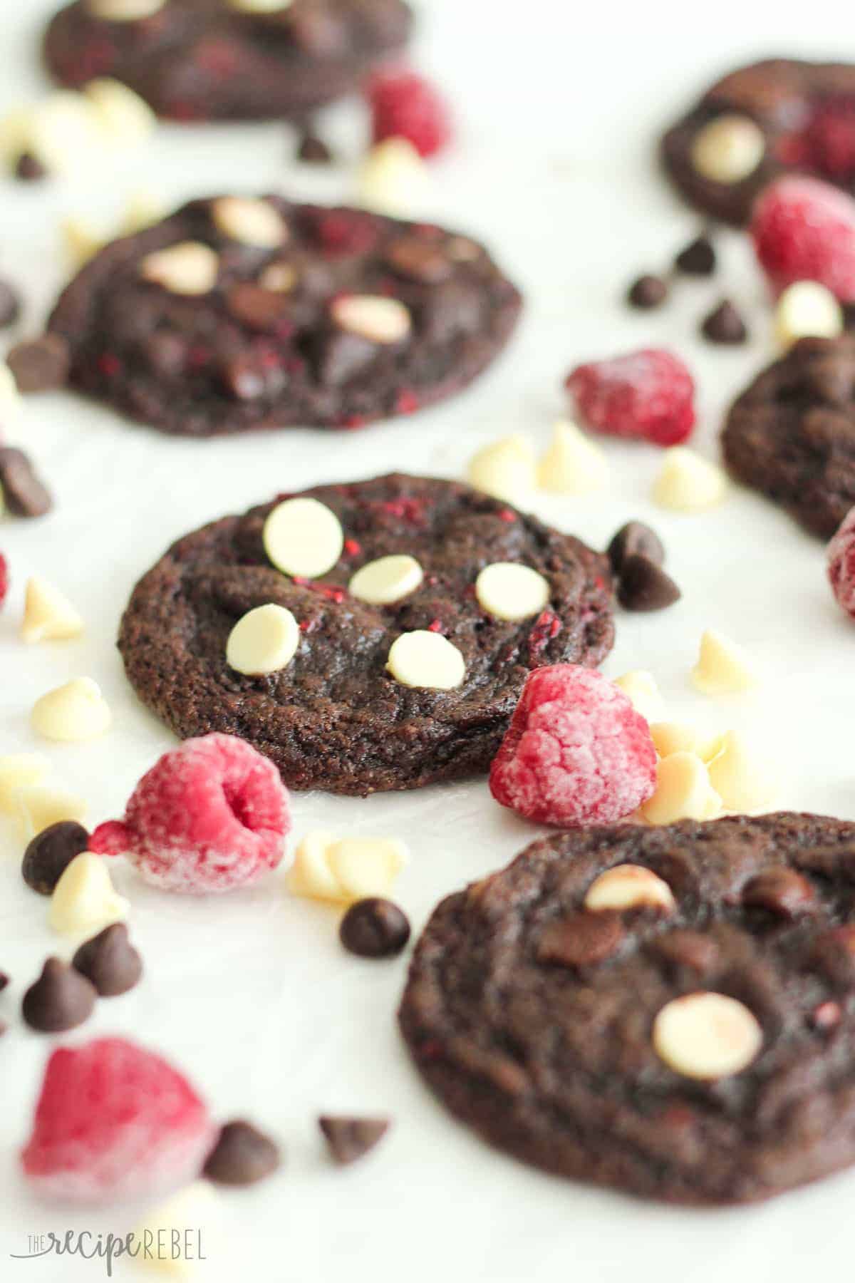 triple chocolate raspberry cookies on parchment paper