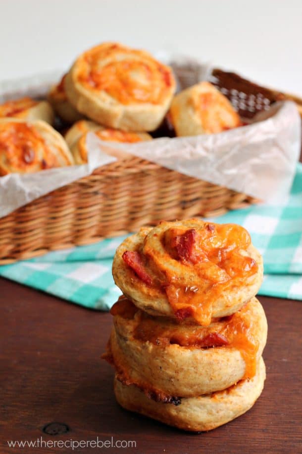 stack of three pizza buns on wooden background