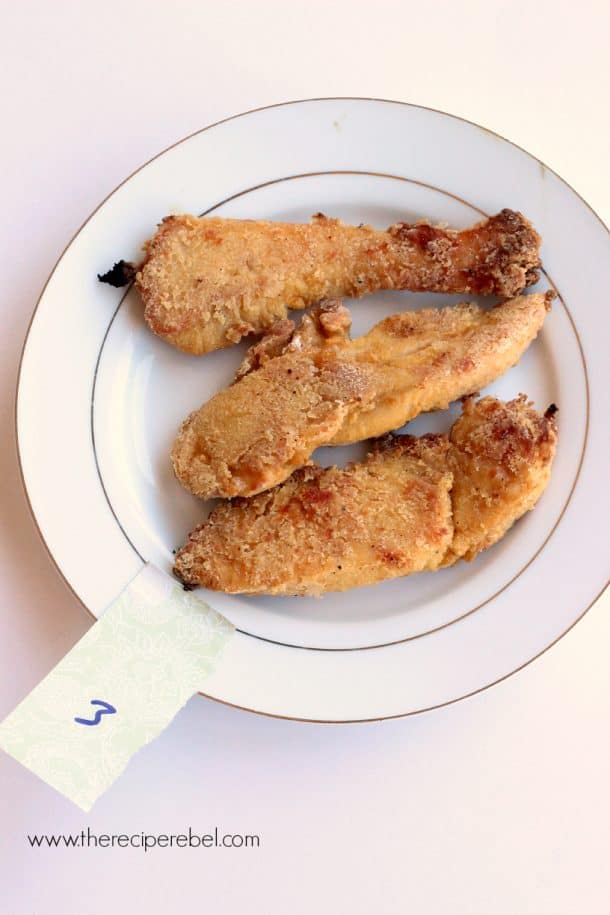 three pieces of oven fried chicken on white plate with a number 3 note on it