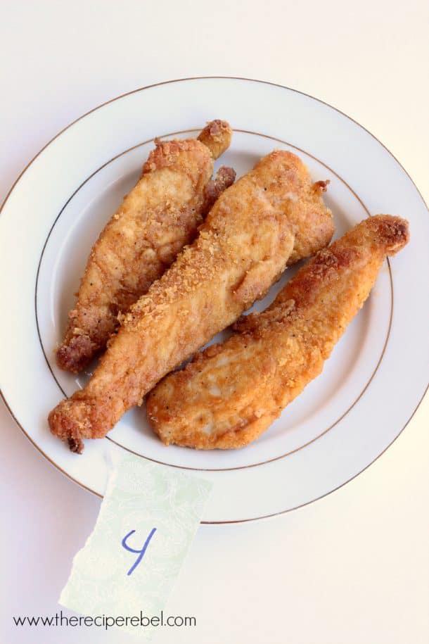 three pieces of oven fried chicken with number four on plate