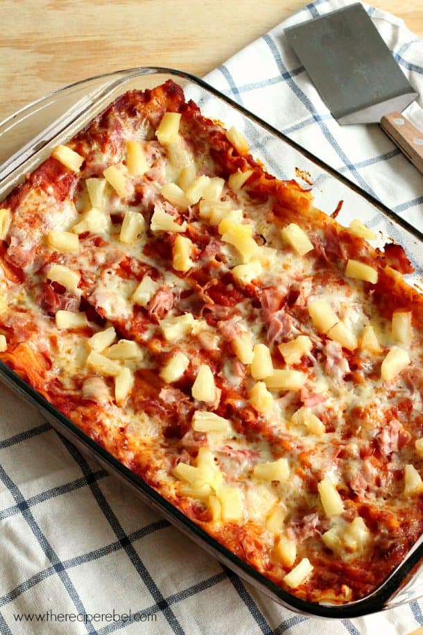 hawaiian lasagna in glass baking dish topped with pineapple tidbits