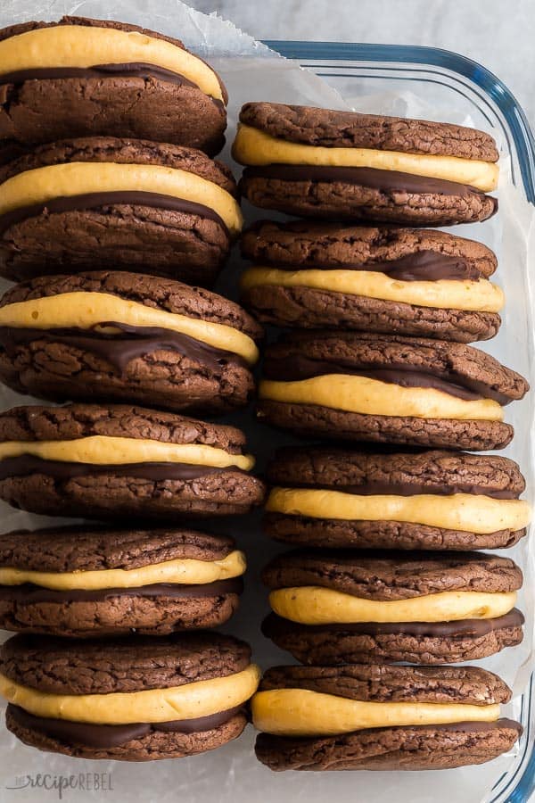 chocolate pumpkin oreos lined up in glass baking dish