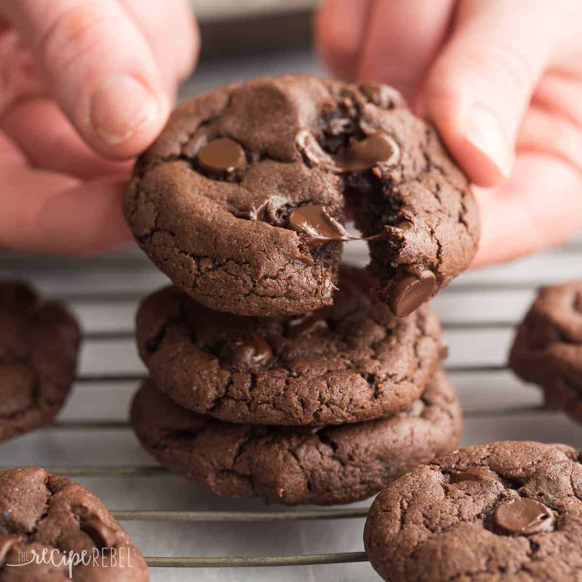 cake mix chocolate chip cookies with hand pulling one apart