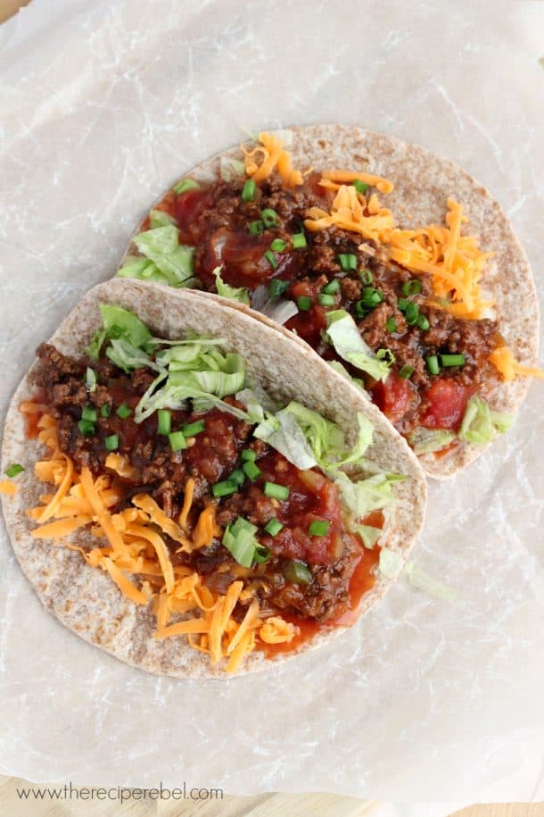 overhead image of classic weeknight tacos on whole wheat tortillas