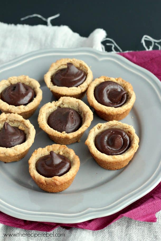 fudge puddles on grey plate with chocolate ganache filling