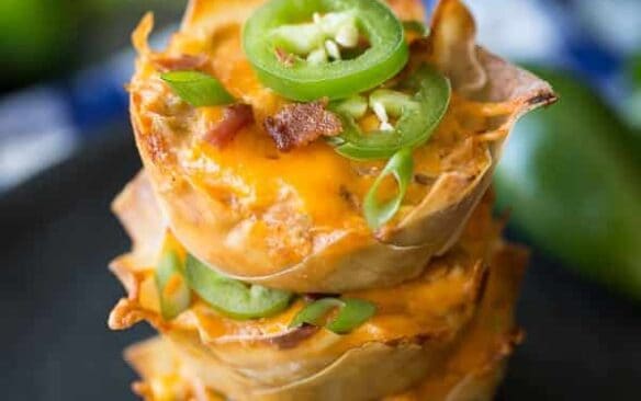 Creamy, spicy Jalapeno Poppers loaded with bacon, chicken and barbecue sauce, stuffed into a crispy wonton cup!