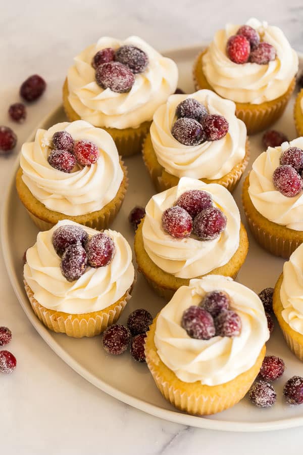 white chocolate cranberry cupcakes with sugared cranberries