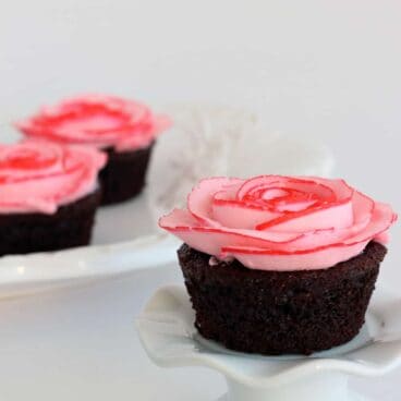 Fudgy Chocolate Cupcakes with Two Tone Roses: they're easier than they look! Frosting tutorial with step-by-step photos. Perfect for that someone special! www.thereciperebel.com