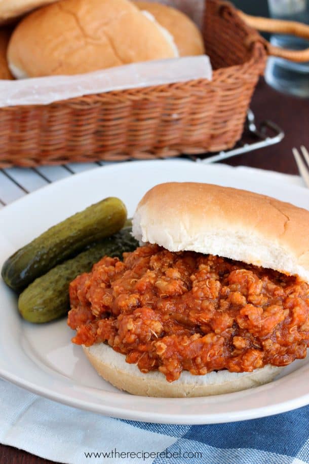 bbq chicken quinoa sloppy joes on white plate closed bun