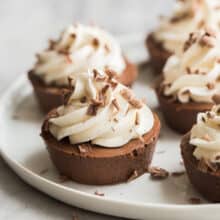 mini chocolate cheesecakes on white plate