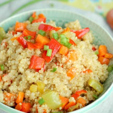 Quinoa Pilaf: a protein and veggie loaded side dish that goes with anything! www.thereciperebel.com