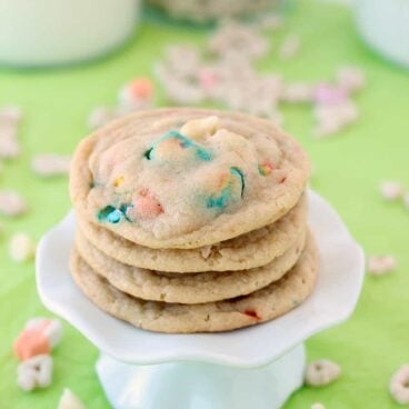 White Chocolate Lucky Charms Cookies: perfectly chewy cookies made with Lucky Charms cereal and marshmallows. Perfect for St. Patrick's Day or just for fun! Breakfast cookie anyone? www.thereciperebel.com