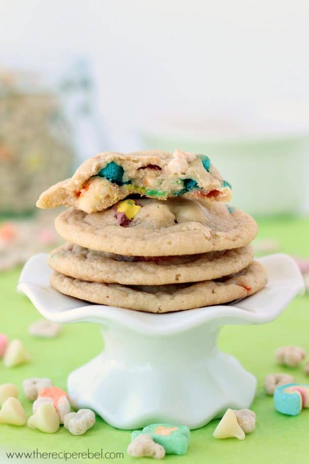 stack of four lucky charms cookies with top cookie broken in half