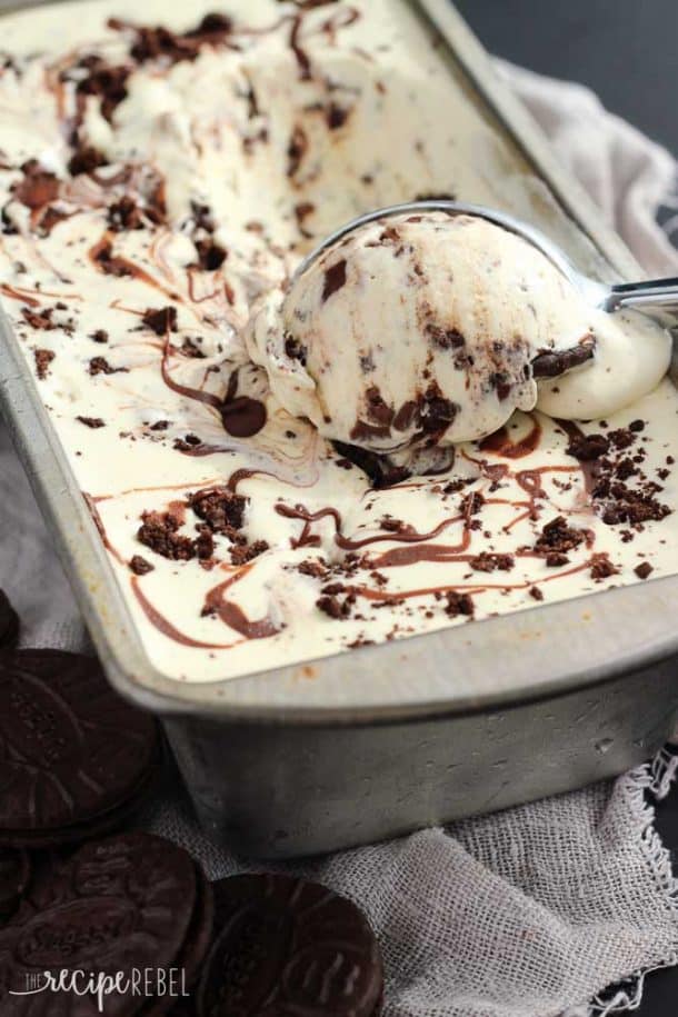 up close image of ice cream scoop scooping cookies and cream ice creeam