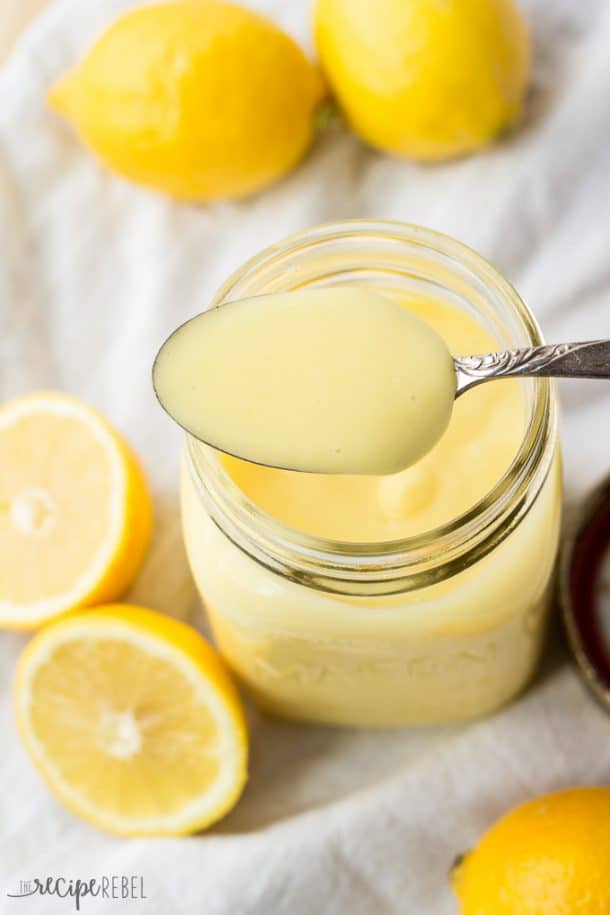 spoon scooping lemon curd out of mason jar