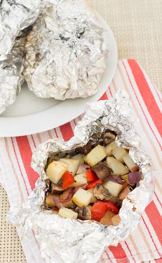 grilled vegetable foil packets with potatoes peppers and onions
