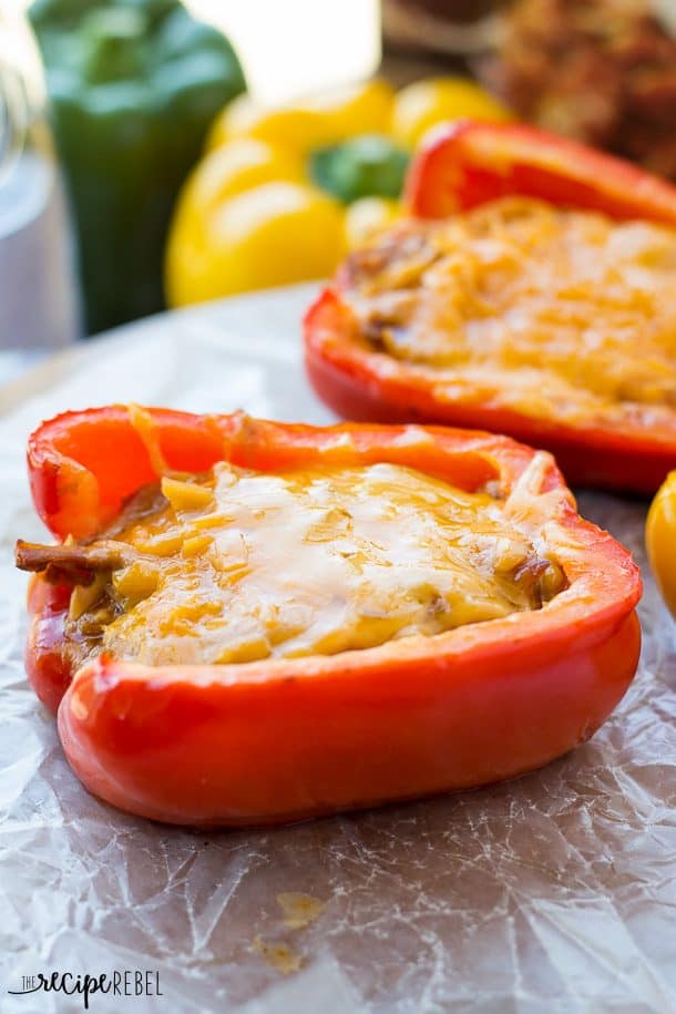 close up of stuffed pepper with pulled pork and melted cheddar cheese