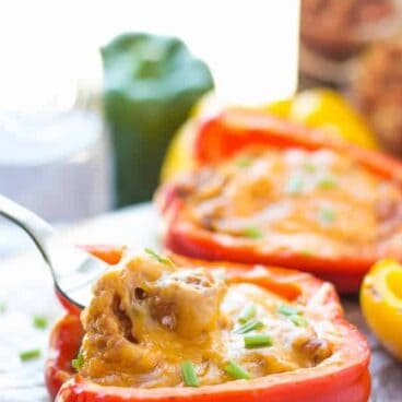 Grilled Pulled Pork Stuffed Peppers and a GIVEAWAY! Sweet bell peppers stuffed with sweet, smoky, tender pulled pork and cheddar cheese and grilled to perfection! Wrap them in tin foil and they’re great for making ahead or packing in a picnic. Only 3 ingredients! Can be made on the grill, in the oven or in the slow cooker. www.thereciperebel.com