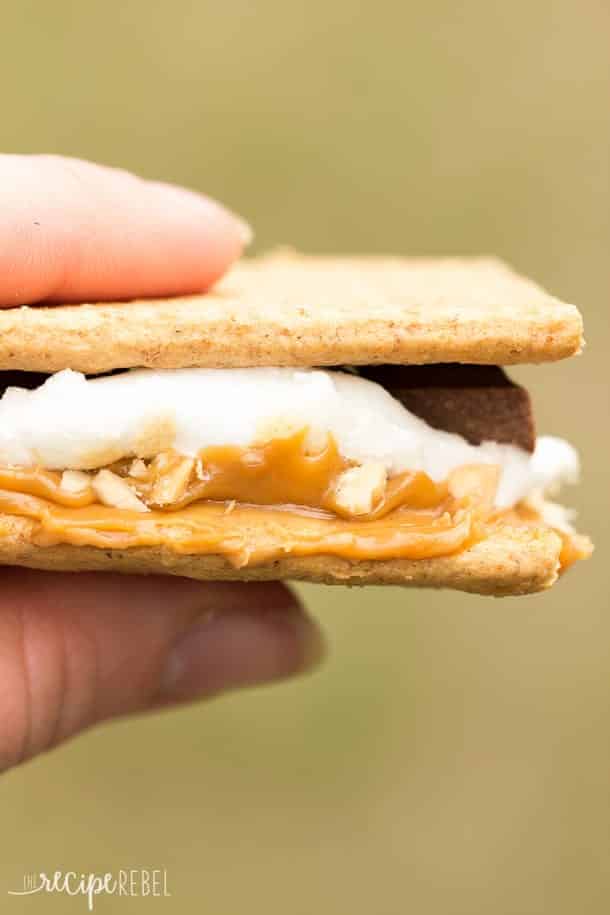 caramel peanut butter smores up close held in hand