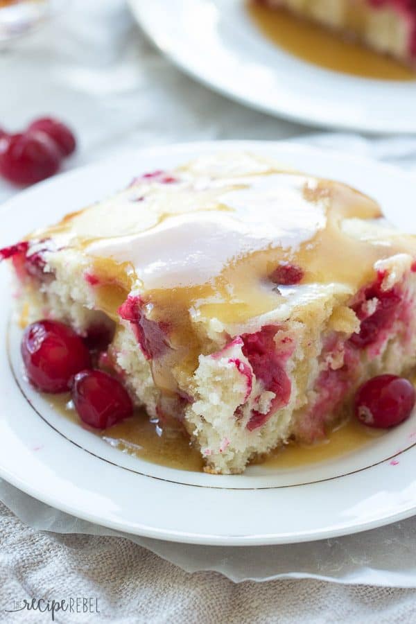 A soft, vanilla cake, loaded with cranberries topped with warm caramel sauce -- an impressive holiday dessert that is so much easier than it looks!