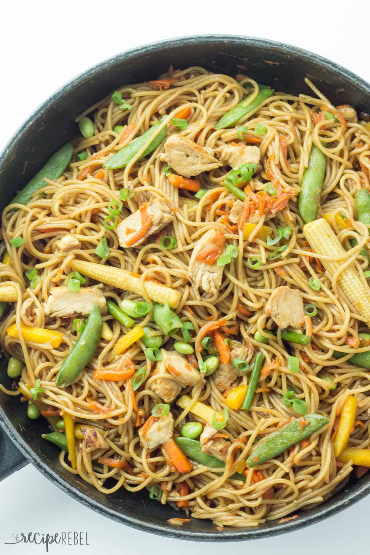 overhead image of black skillet with one pot chicken chow mein