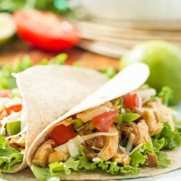 Sweet and spicy slow cooked chicken makes taco night new again. I love using my crockpot for easy, weeknight meals!