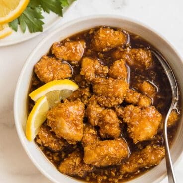 baked honey lemon chicken in bowl