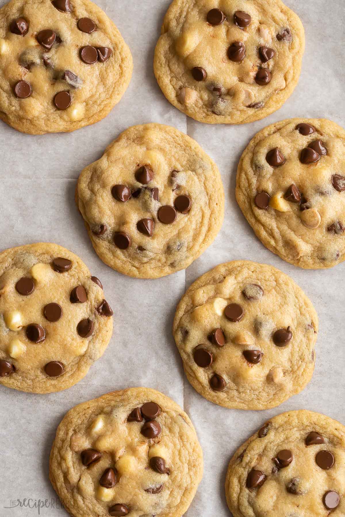 overhead image of chocolate chip cookies on parchment paper
