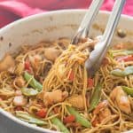 An easy, one pot version of Chicken Chow Mein - loaded with peppers, cabbage, peas and carrots it's an easy, healthy meal the whole family loves! Say no to takeout ;) Includes step by step recipe video. | one pot pasta | one pot meal | one pan meal | easy dinner recipe | healthy dinner recipe | family friendly | takeout | Chinese | Asian