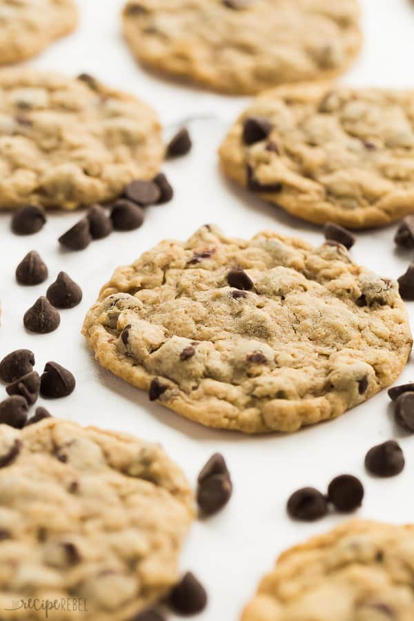 peanut butter oatmeal chocolate chip cookies close up with scattered chocolate chips