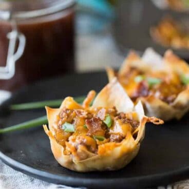 Bacon, beef, barbecue sauce and cheese stuffed into a wonton wrapper and baked until crispy -- the perfect finger food for game day or any party!