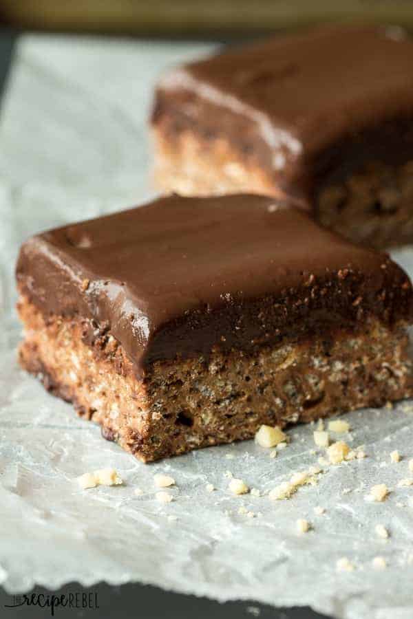 chocolate rice krispie treat close up with smooth chocolate truffle layer on top