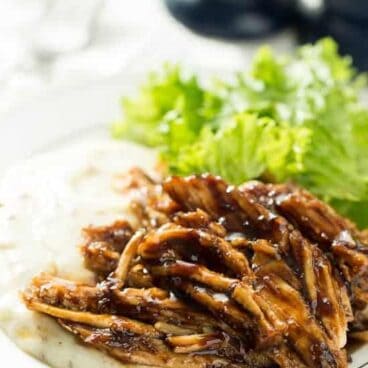 Tender, moist turkey breast brushed with a sweet and tangy apricot balsamic glaze -- the perfect slow cooker meal for the holidays so you can enjoy your guests!