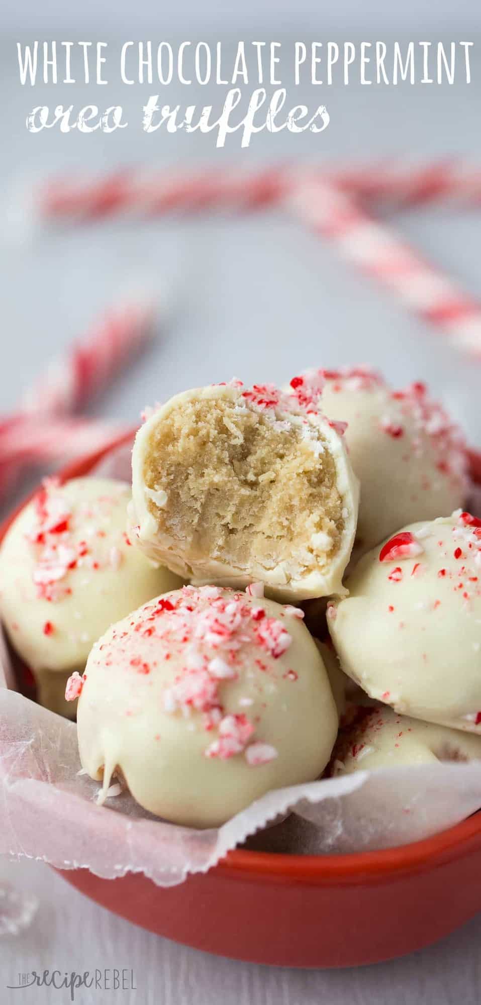 white chocolate peppermint oreo truffles with a bite taken out of the top truffle