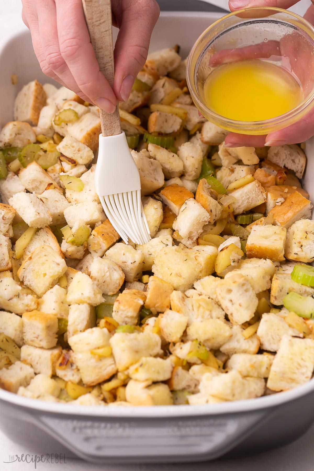 brushing the top of the stuffing with melted butter.