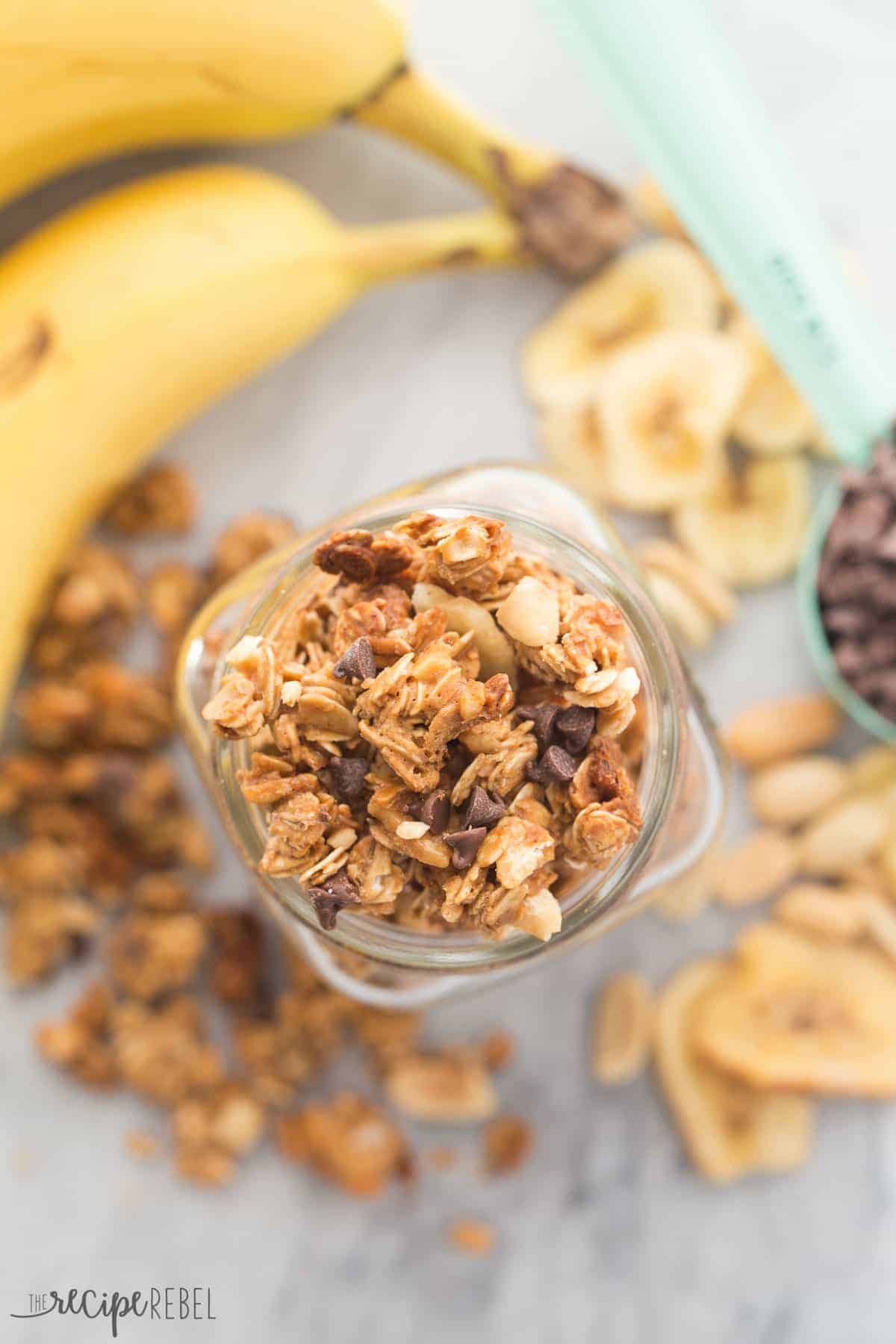 overhead image of chunky monkey granola in glass mason jar close up