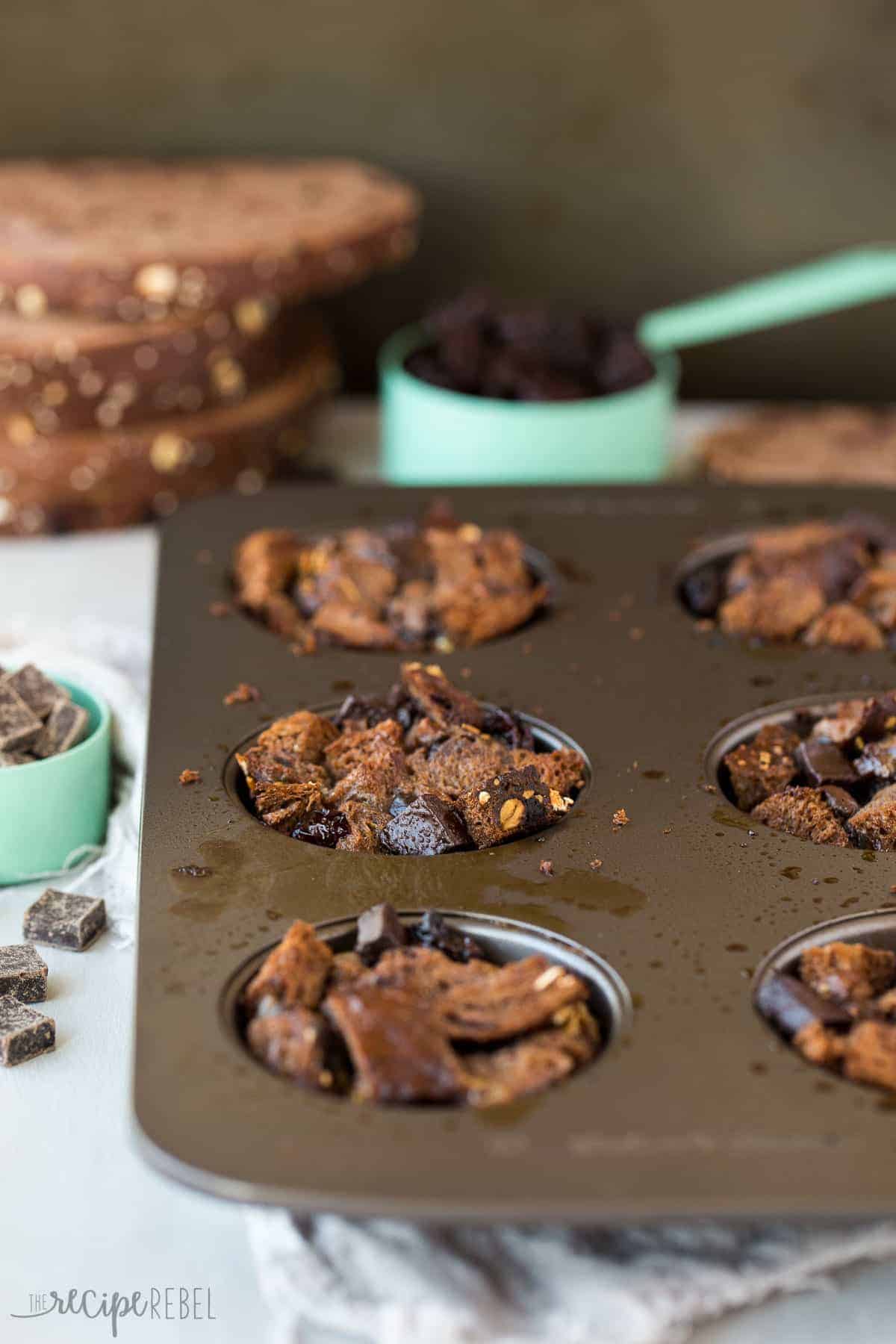 non stick muffin pan with individual chocolate cherry french toast in cups