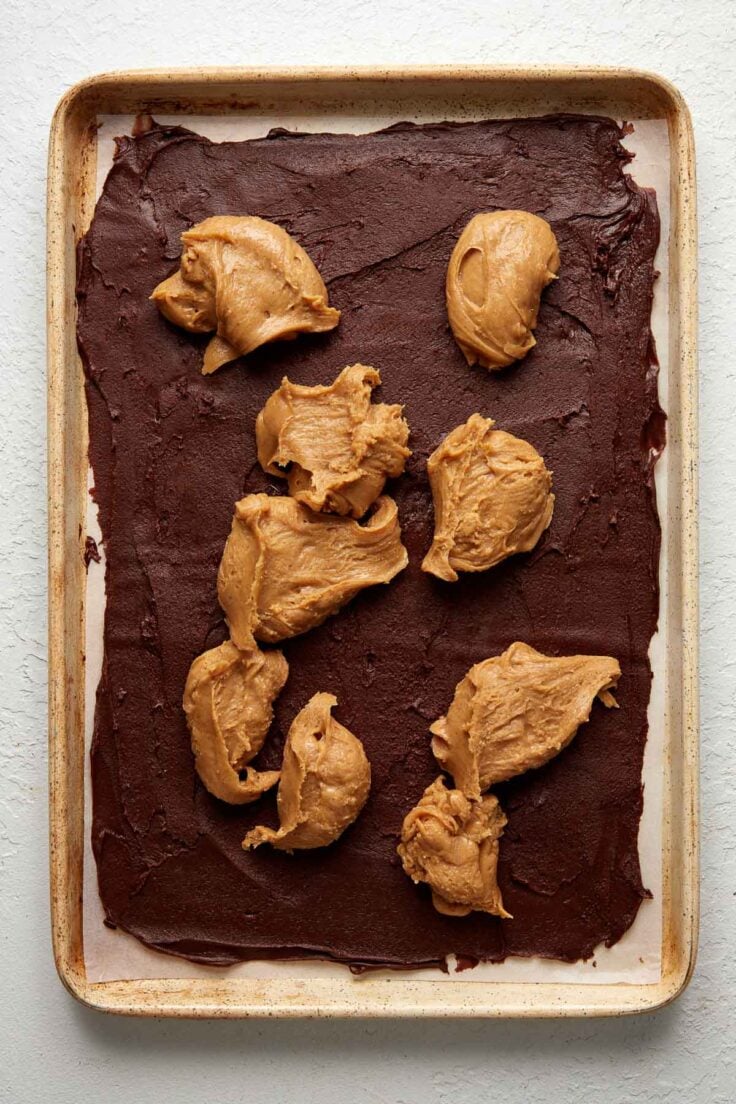 dollops of peanut butter fudge on top of chocolate fudge layer.