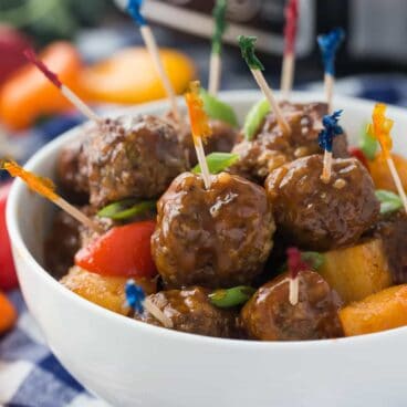 These Pineapple Brown Sugar Meatballs are smothered in a homemade BBQ sauce and cook in the slow cooker, making them an easy game day appetizer, weeknight meal, or holiday potluck offering!